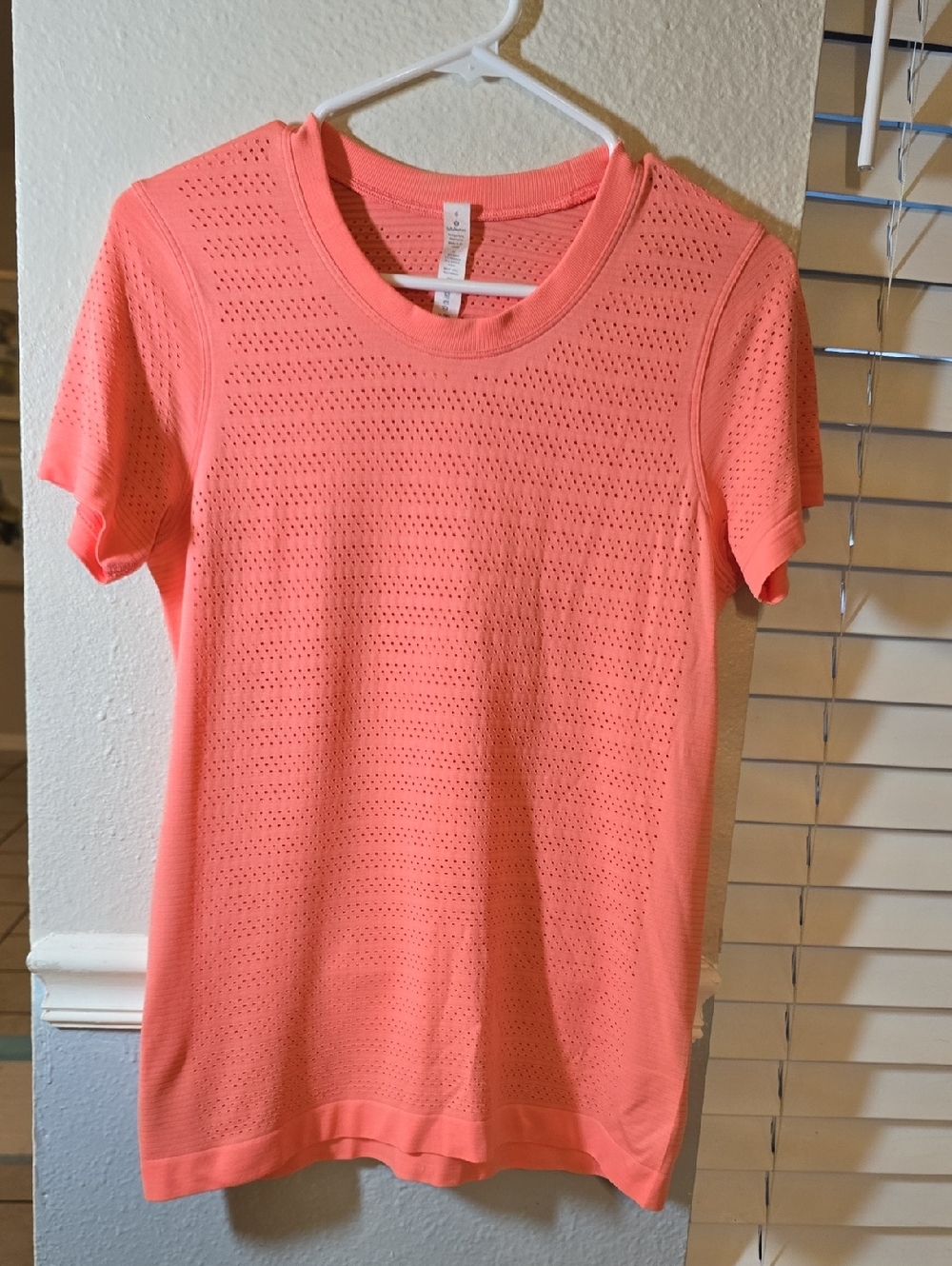 Lululemon athletica Coral Perforated Short Sleeve Tee